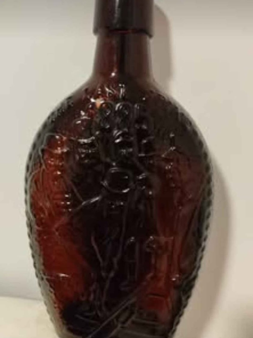 Vintage commemorative brown glass bottle
The last spike 1885